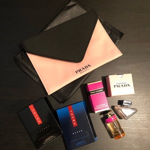 Prada mini perfumes set+cosmetic bag. Price firm